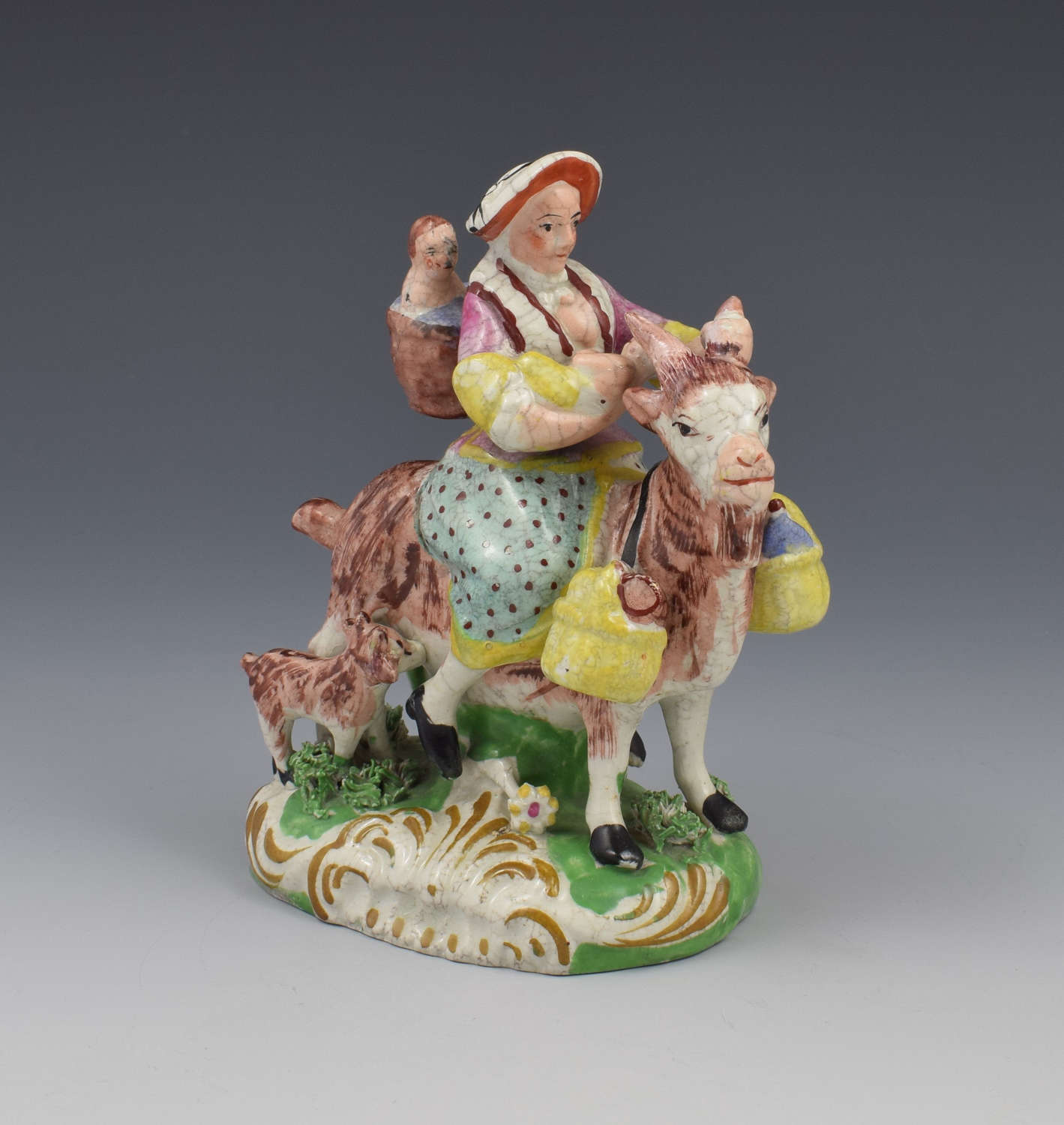 Staffordshire Figure Welch Tailor's Wife Riding Goat